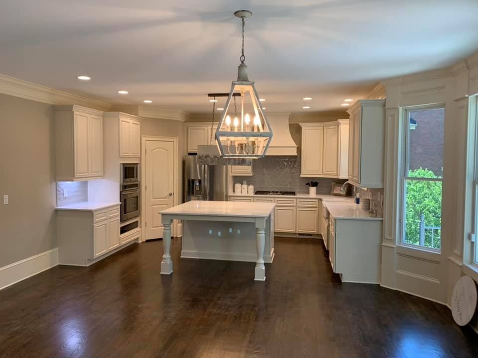 There is a large island in the middle of the kitchen