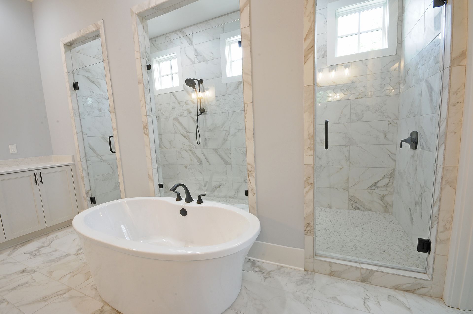 There is a bathtub in the middle of the bathroom.