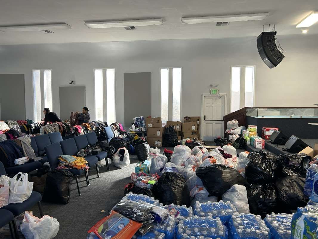 A large room filled with lots of bags and boxes.
