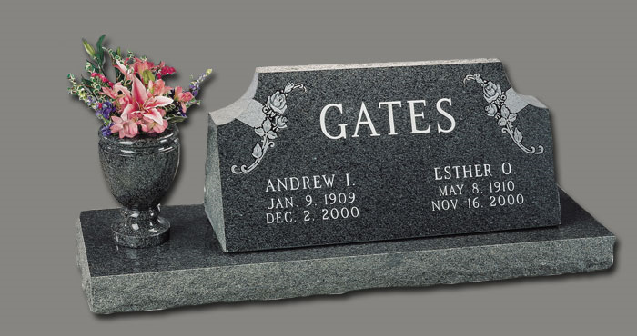 Headstone for Andrew and Esther Gates, with floral vase. Dates: 1909-2000, 1916-2000. Black granite on a gray base.