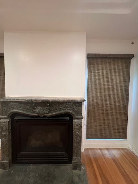 There is a fireplace in the middle of the room.