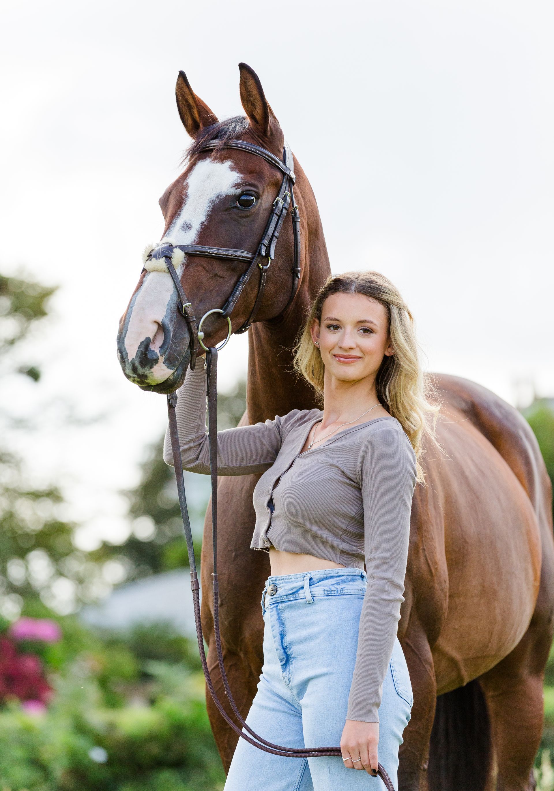 Palm trees against a cloudy sky.