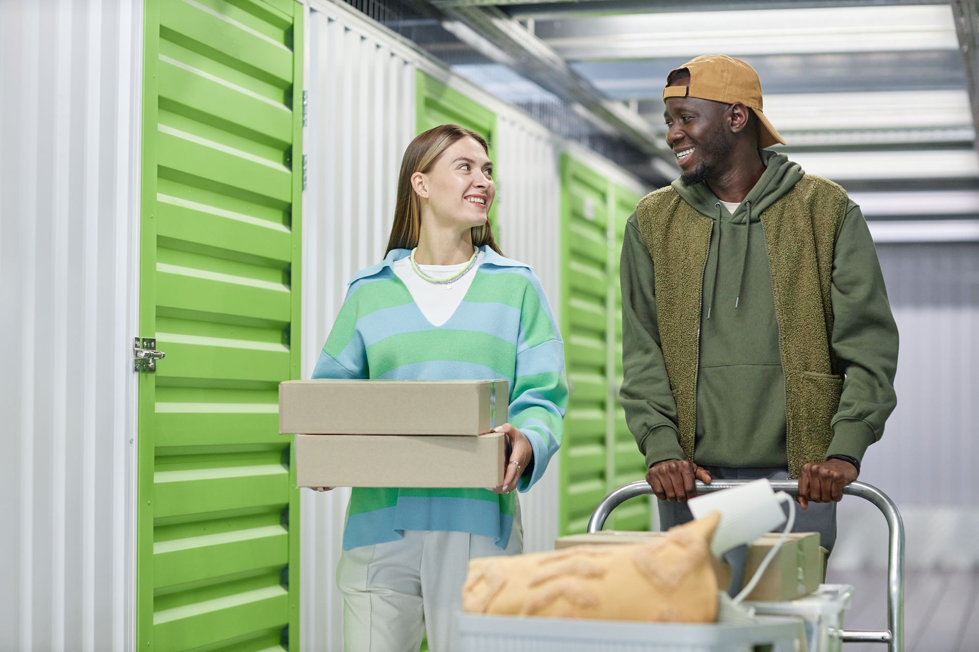 People carrying boxes into a climate-controlled storage unit in Milwaukee, WI