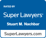 The logo for super lawyers stuart m. nachbar is blue and white.