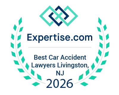 Expertise.com award: Best Car Accident Lawyers, Livingston, NJ. Turquoise and blue logo within a laurel wreath, year 2026.
