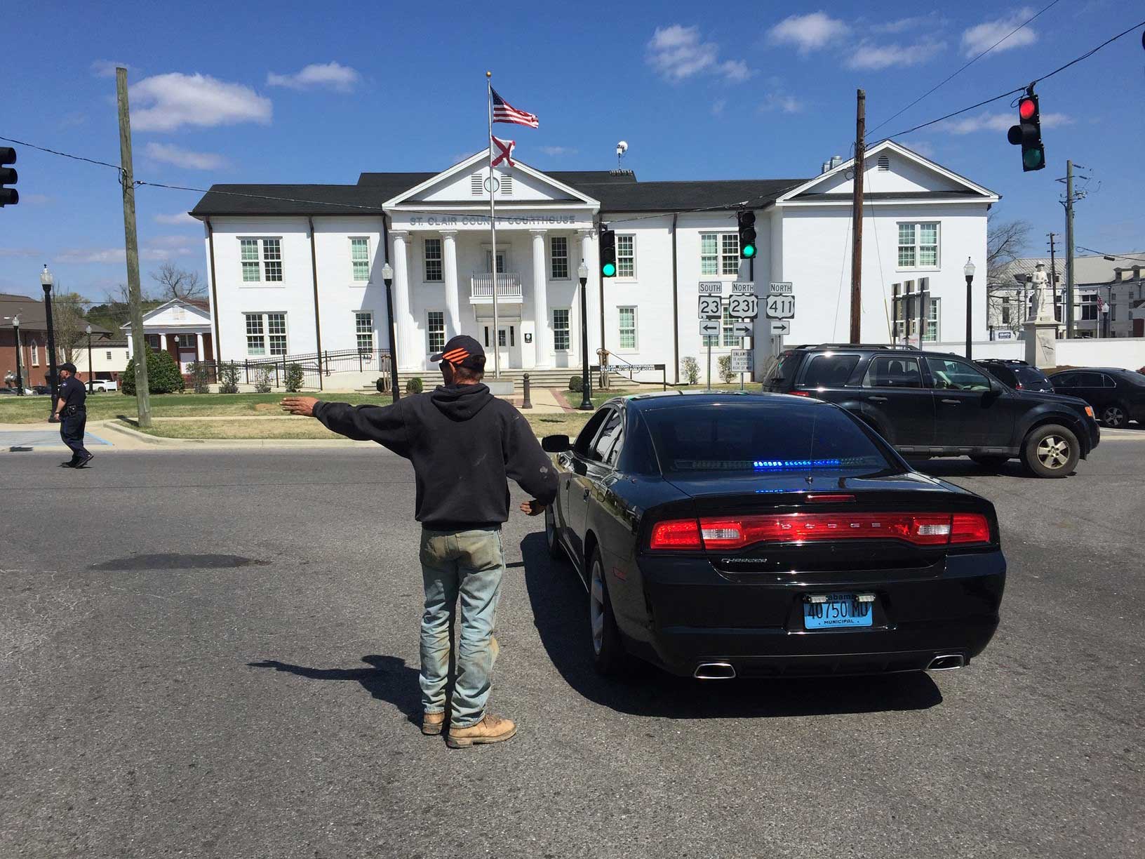 Emergency Lot Clearing — Man Assisting The Driver In Albertville, AL