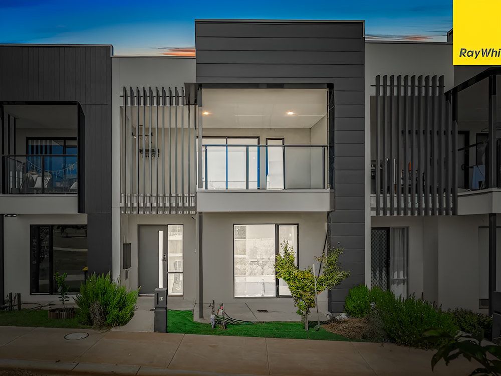 A Modern House With A Balcony And A Lot Of Windows Is For Sale — Romy Sidhu Ray White Weir Views In Melton, VIC