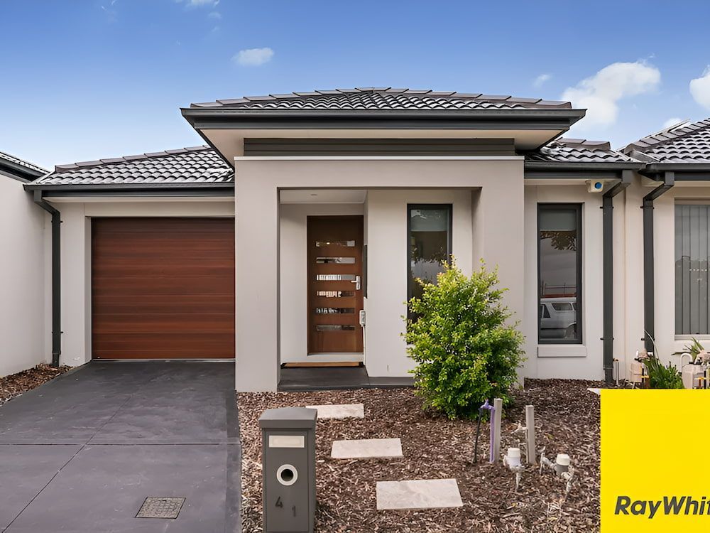 The Front Of A House With A Yellow Sign That Says Ray White — Romy Sidhu Ray White Weir Views In Weir Views, VIC