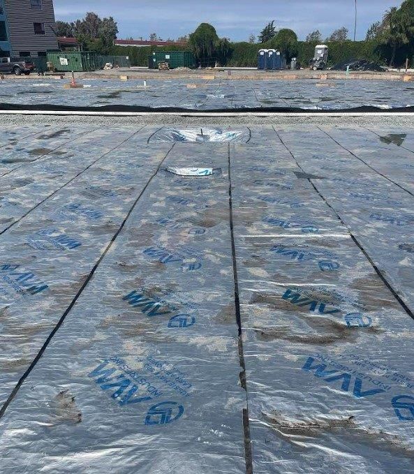 A large amount of plastic is covering a wooden floor.  | Oakland, CA  | Diablo Roofing