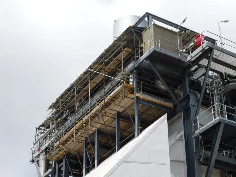 A large building with scaffolding on top of it