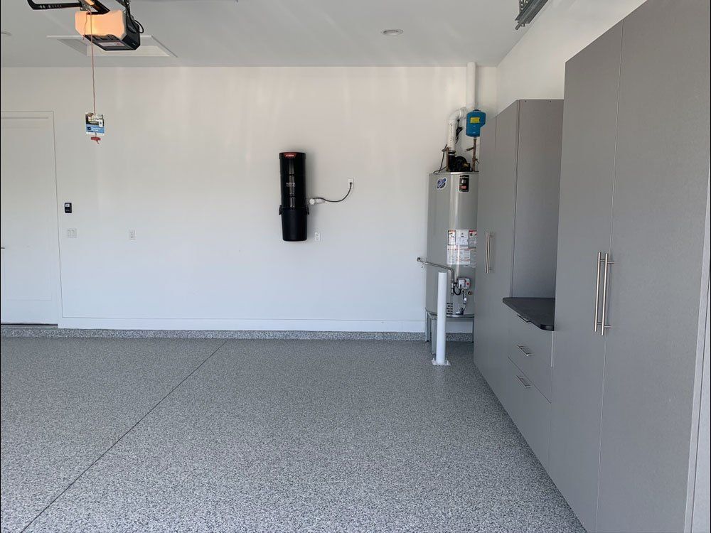 Custom Garage Cabinets, Flooring and Wall Organizer Installation