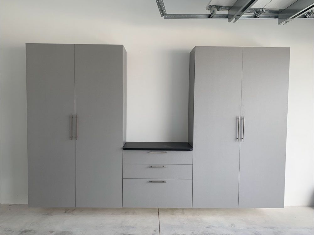 Custom Garage Cabinets, Flooring and Wall Organizer Installation