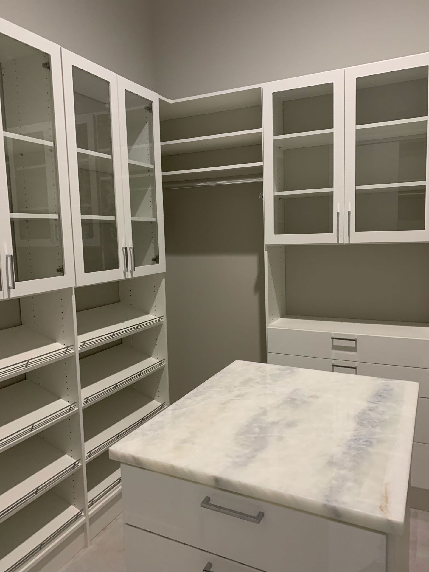 High Gloss Acrylic Closet System with Marble Top Island