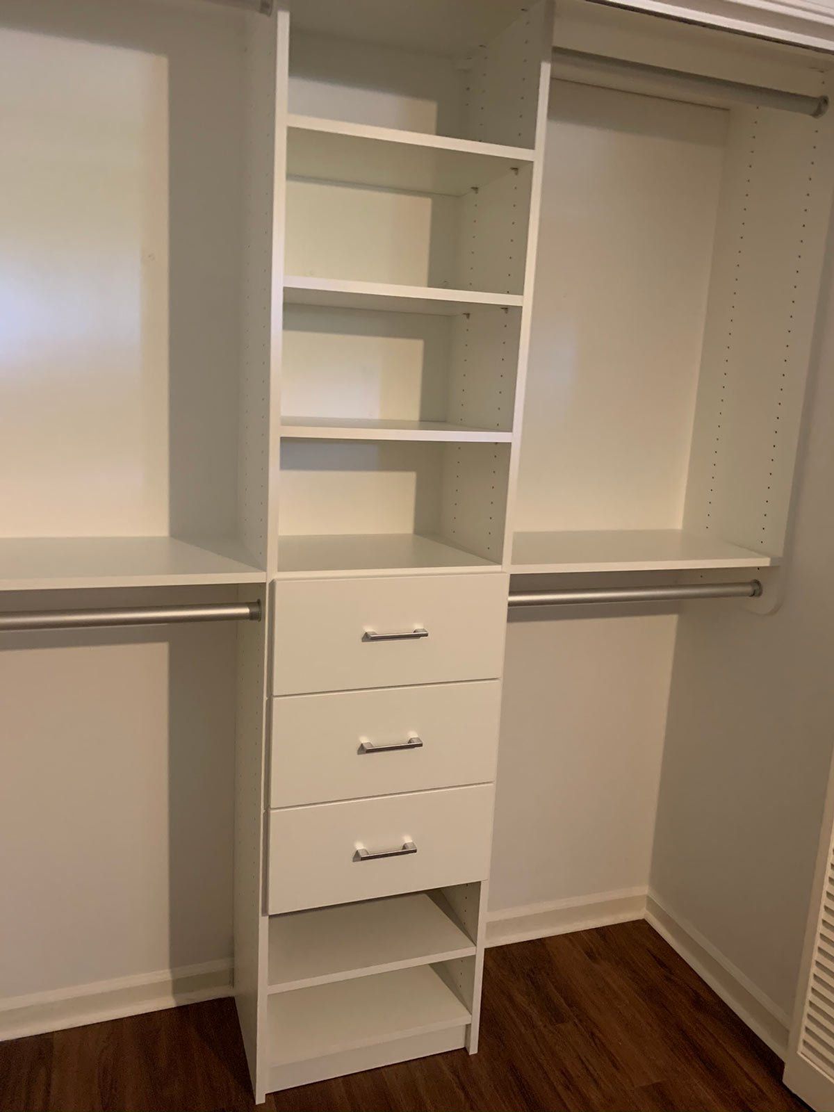 White Closet System with Modern Drawer Fronts & Chrome Hardware