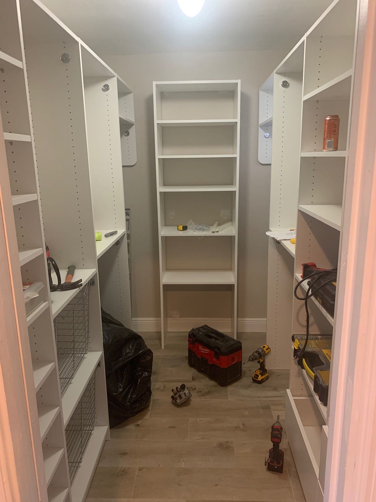 Custom Closet System with Modern Drawer Fronts, Chrome Hardware & Sliding Baskets