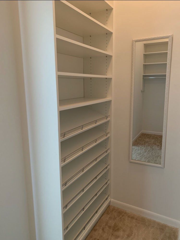 White Custom Closet - Modern Drawer Fronts With Half Angled Shoe Tower