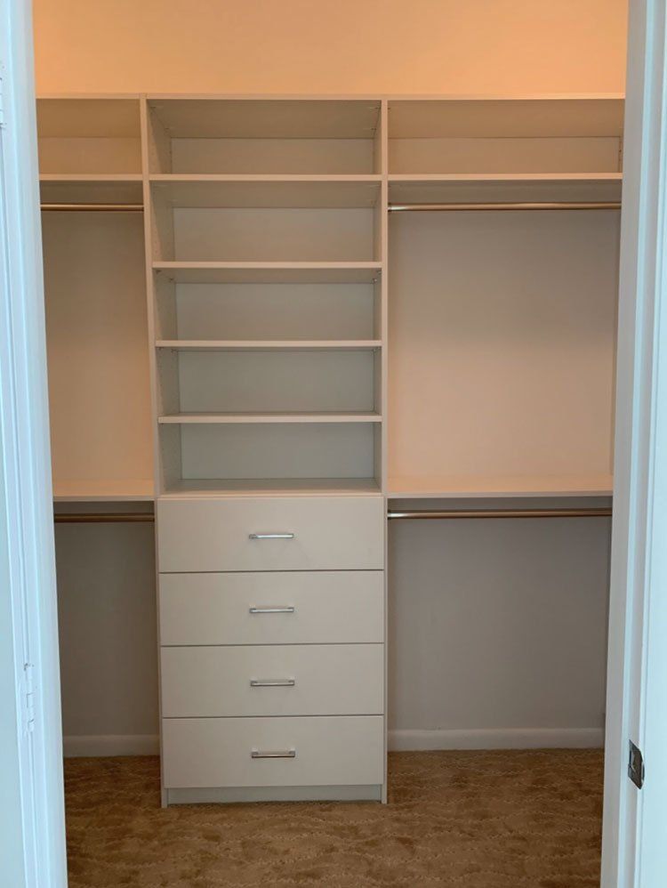 White Custom Closet - Modern Drawer Fronts With Half Angled Shoe Tower