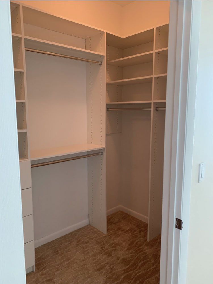 White Custom Closet - Modern Drawer Fronts With Half Angled Shoe Tower