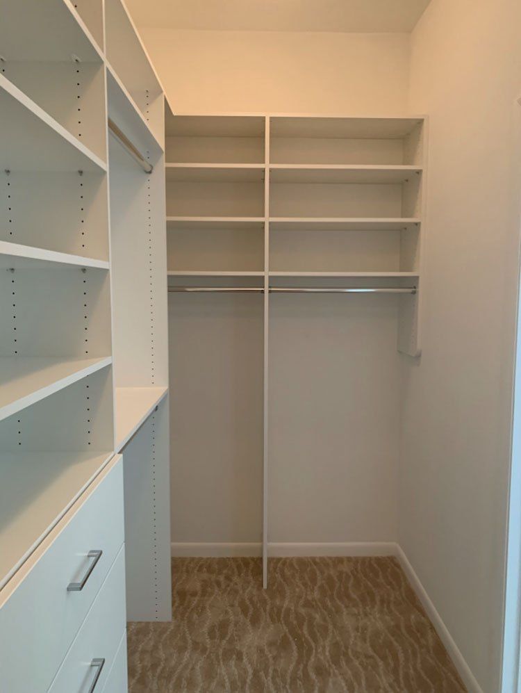 White Custom Closet - Modern Drawer Fronts With Half Angled Shoe Tower