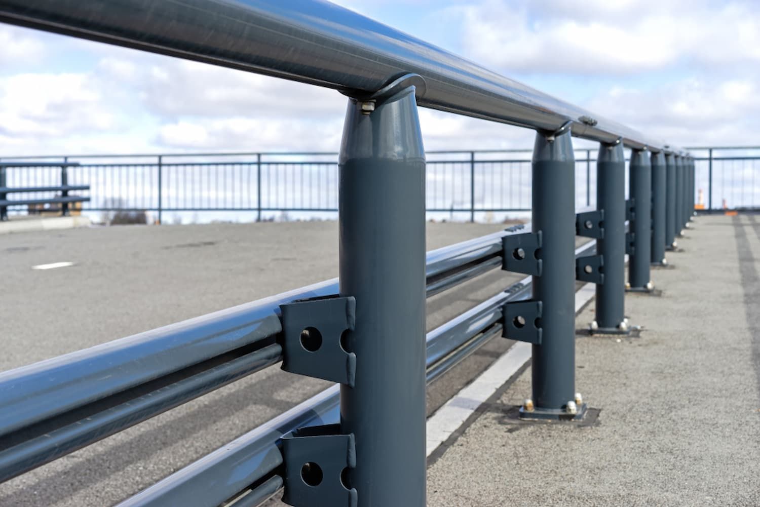 A Close-up Of a Metal Railing on A Bridge — Alamo Powder Coaters in Unanderra, NSW