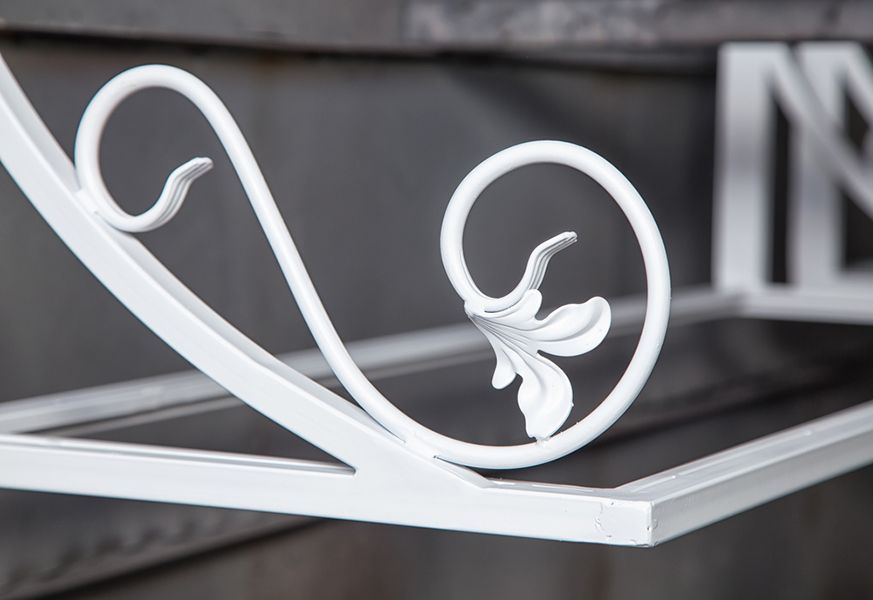 A White Wrought Iron Shelf with A Flower Design on It — Alamo Powder Coaters in Unanderra, NSW