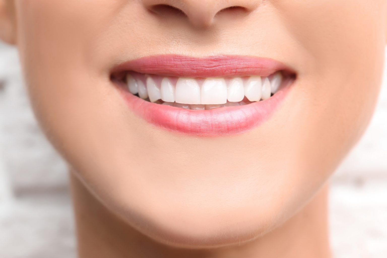 smile with teeth | Custom teeth whitening in Monroe Township, NJ for a brighter smile.