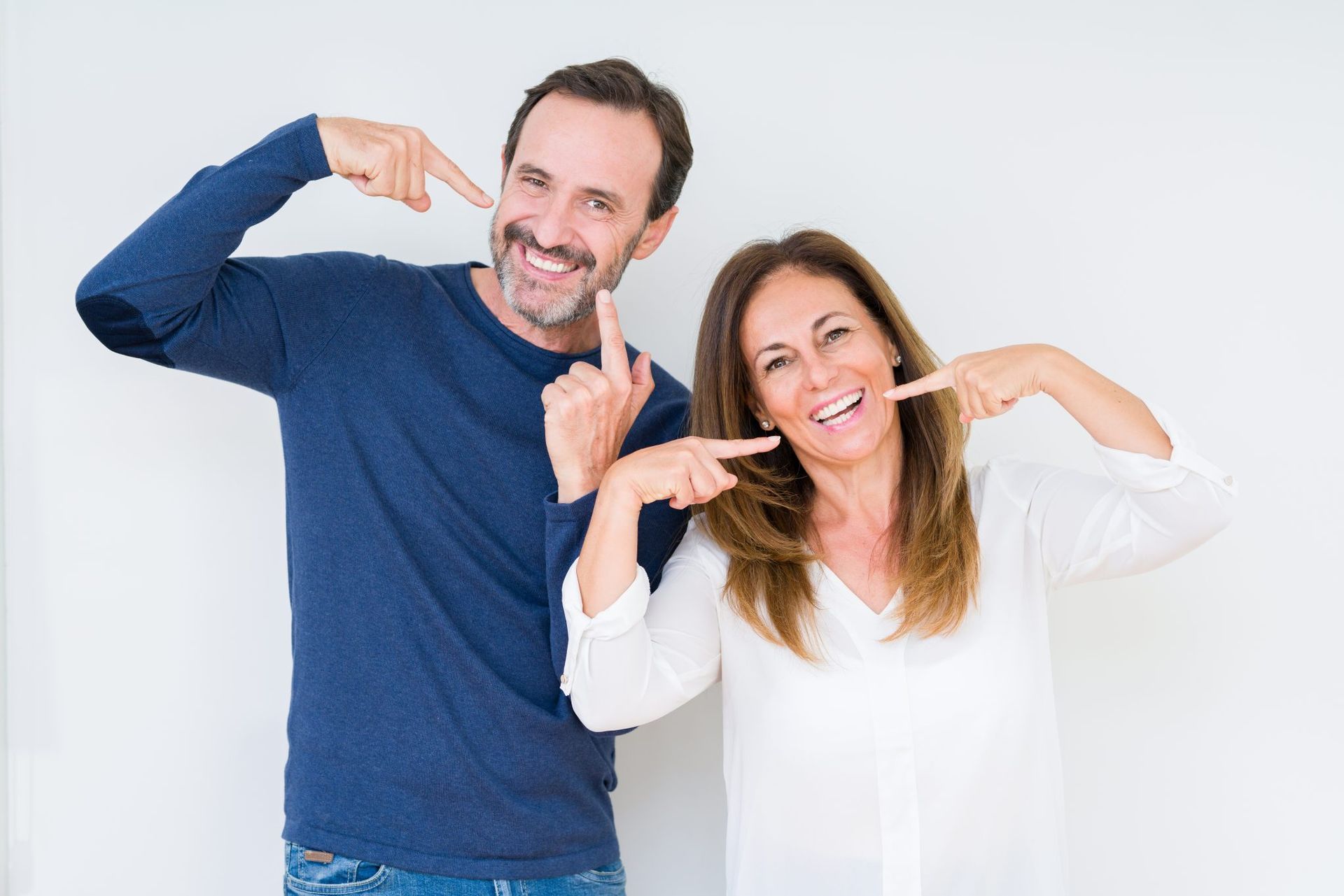 man and woman smiling | Invisalign in Monroe 08831 and highland park 08904