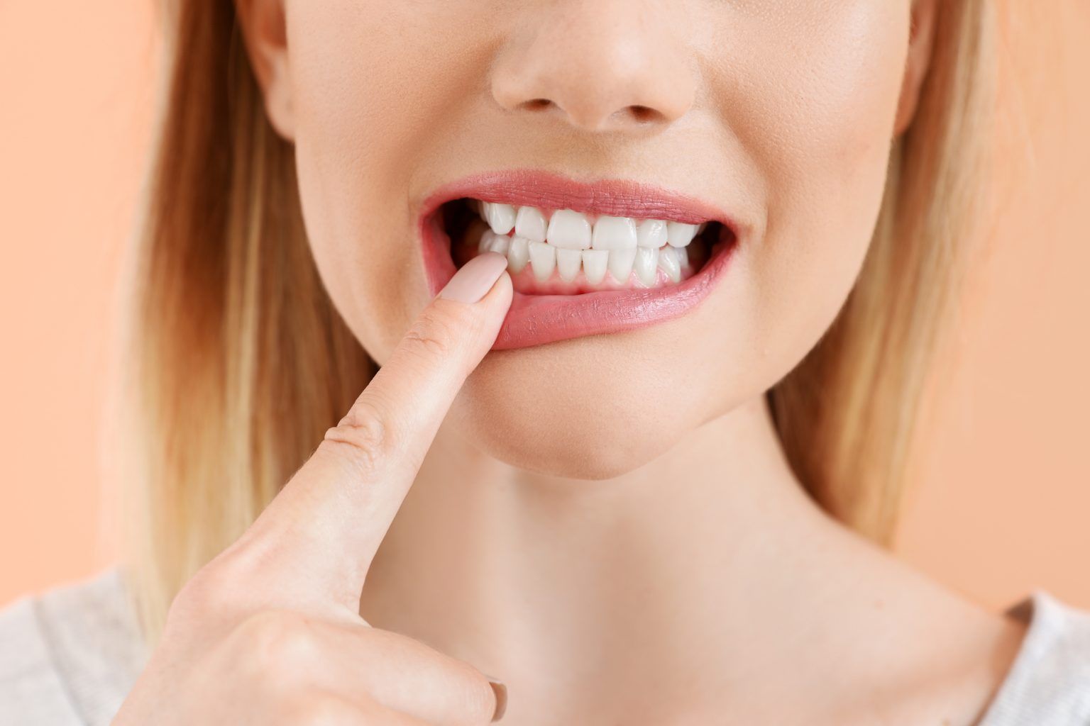 woman showing her teeth