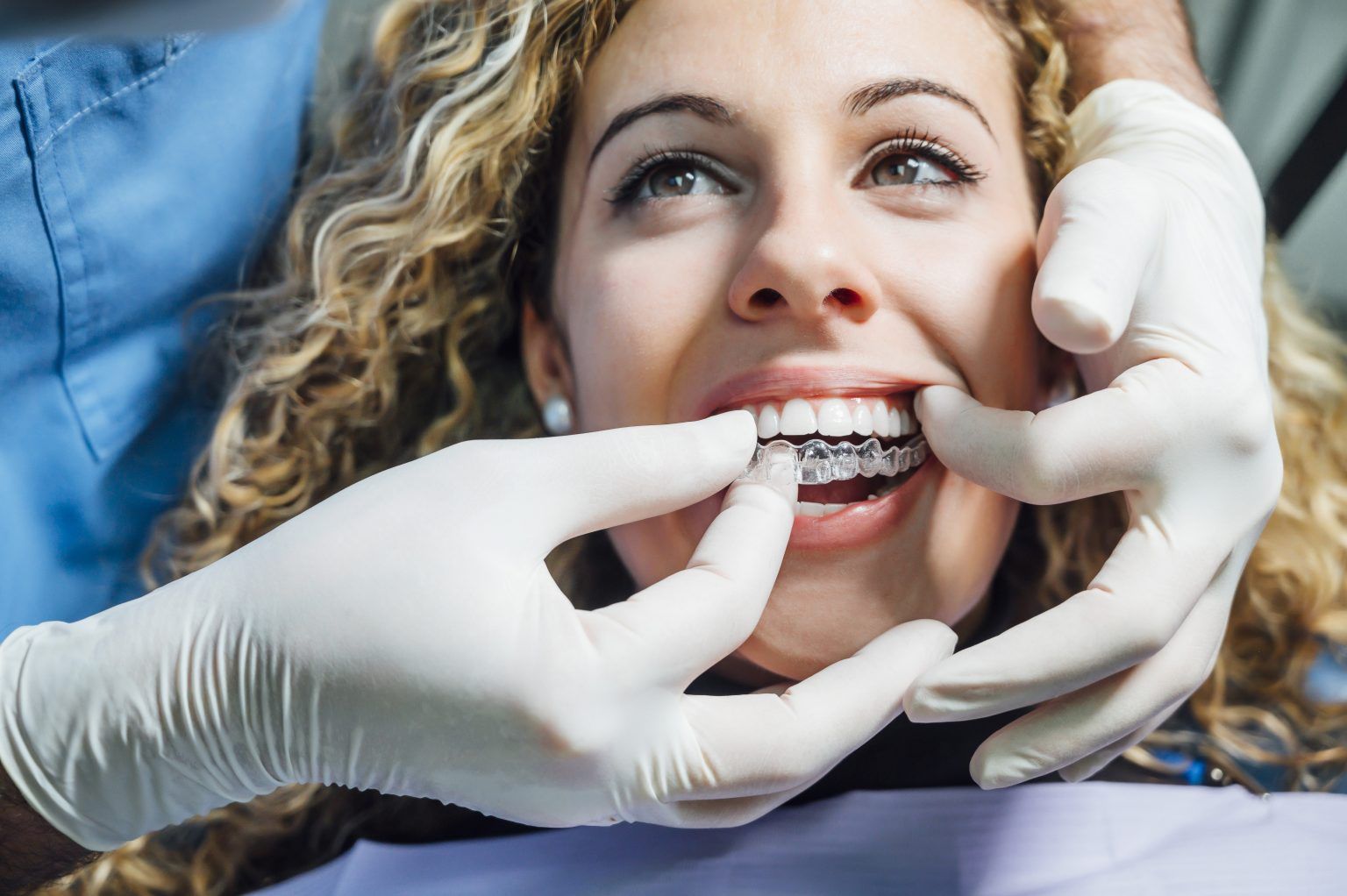 woman having an invisalign|