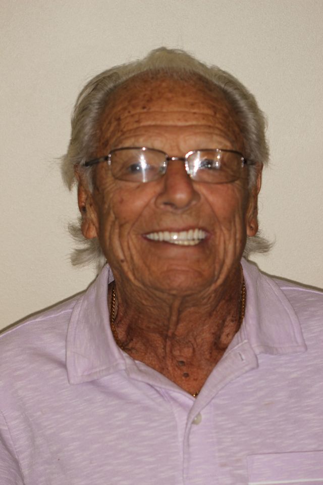 old man smiling after dentures in Monroe township and highland park nj