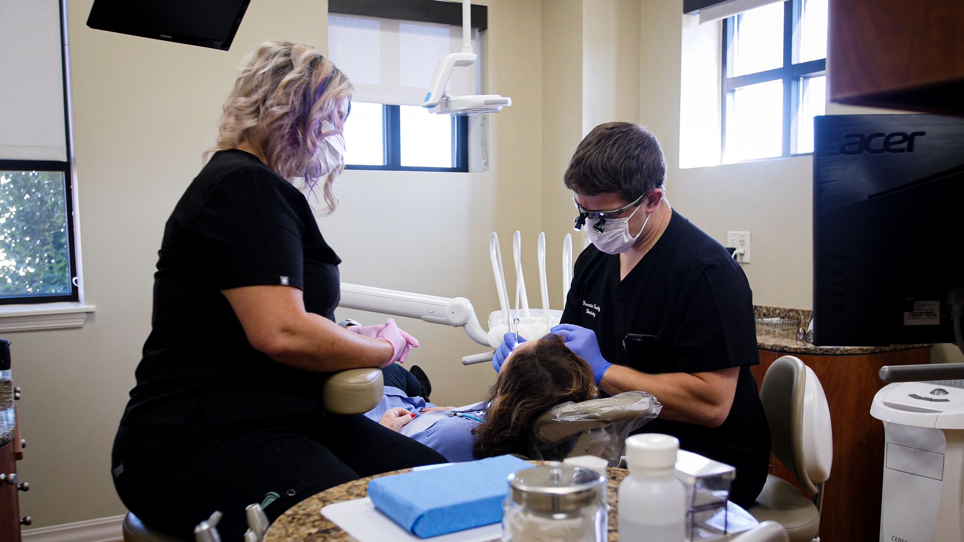 smiling man in dental clinic