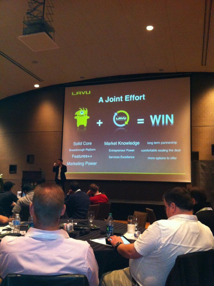 A joint effort = win is displayed on a large screen