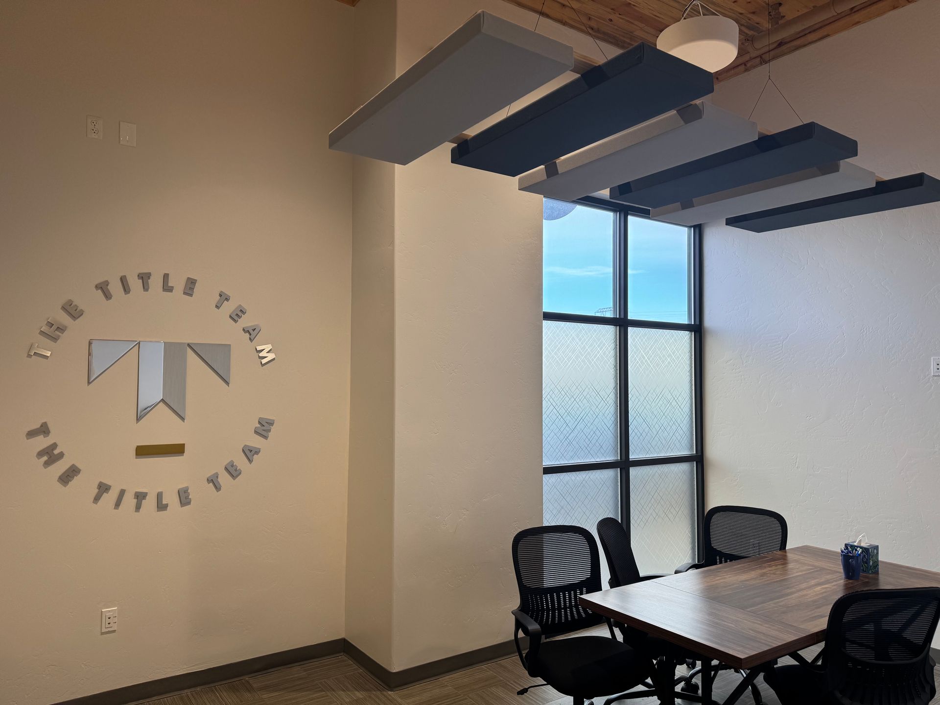 Suspended acoustic treatments and Atlas IED® active sound masking at The Title Team, Kalispell