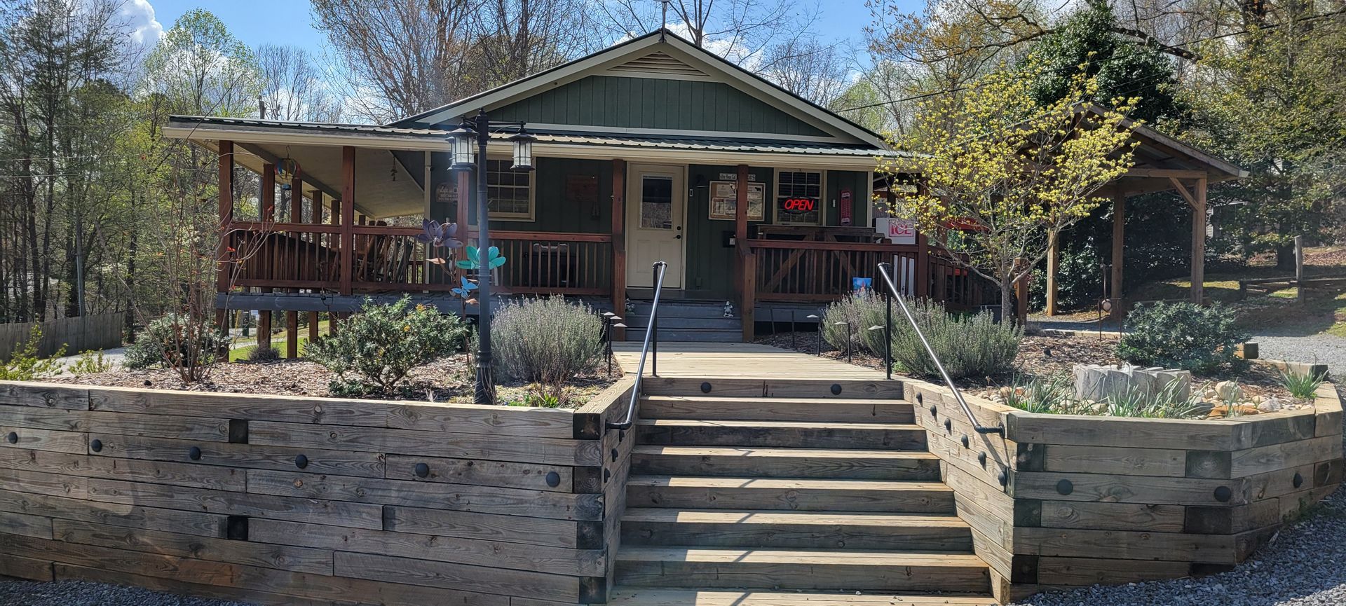 The front of a house with stairs leading up to it