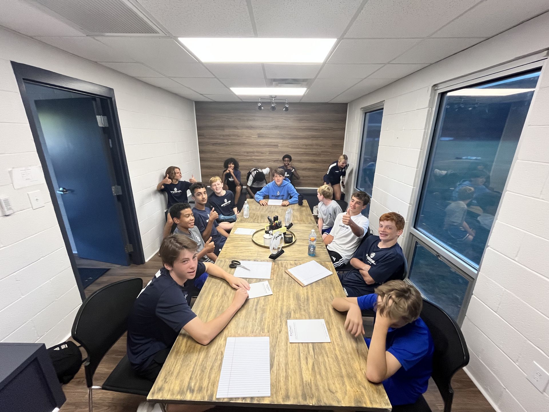 Team film session in clubhouse