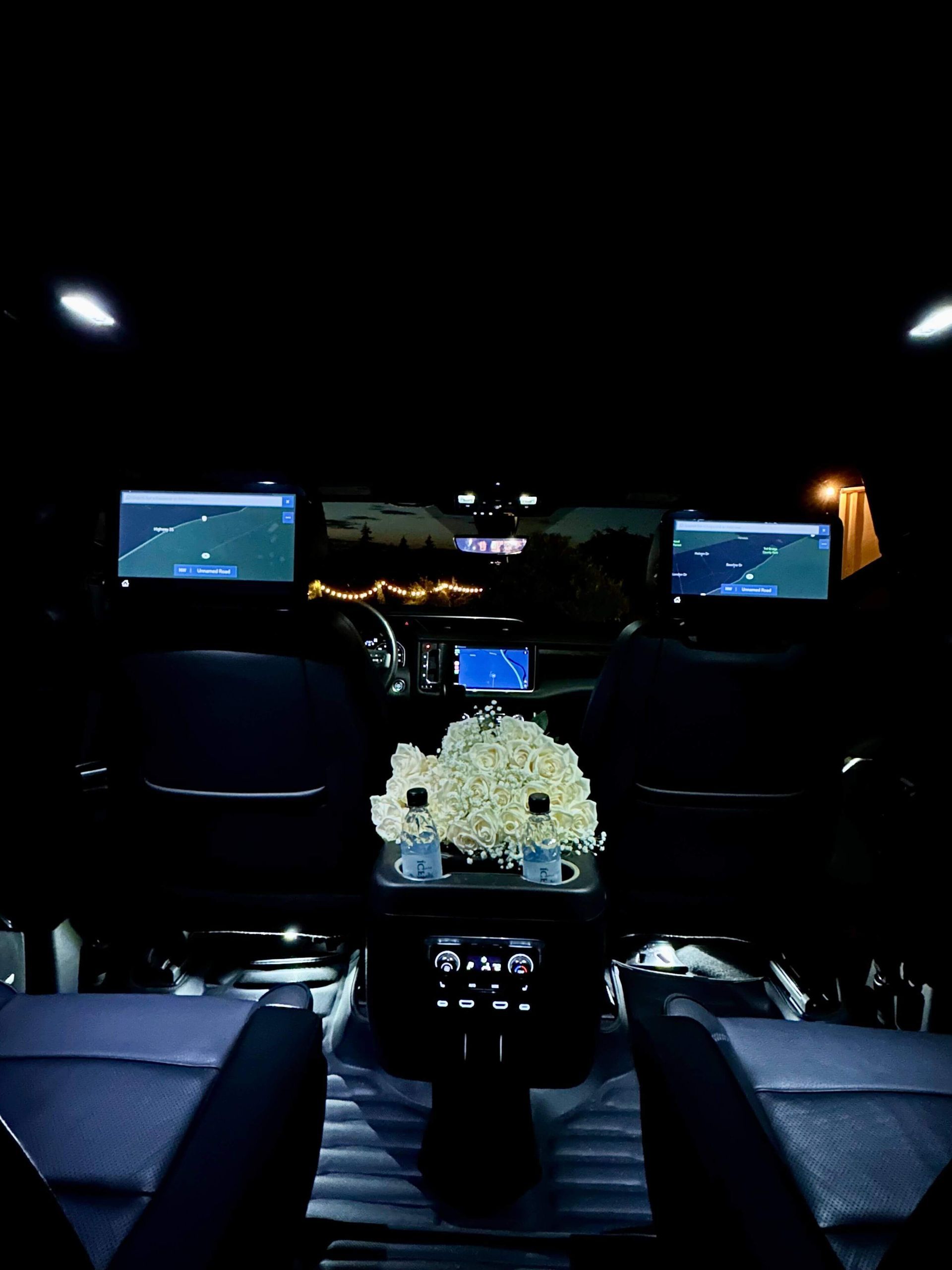 Chauffeur greeting clients with flowers on Valentine’s Day in portland Oregon