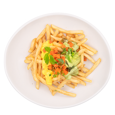 Fries in a white bowl, topped with orange cheese sauce, pico de gallo, and green sauce.