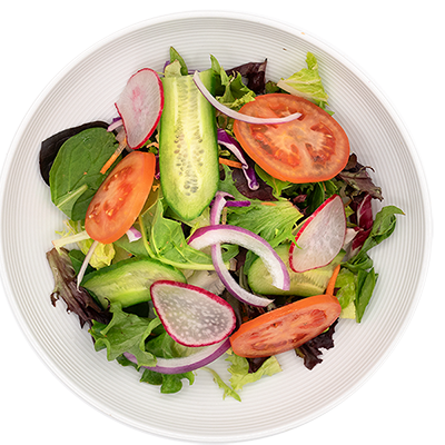 Salad in a white bowl with tomato slices, cucumber, radish, and red onion.