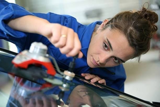 Female Technician Checking Windshield — Fort Worth, TX — Auto Glass Xperts