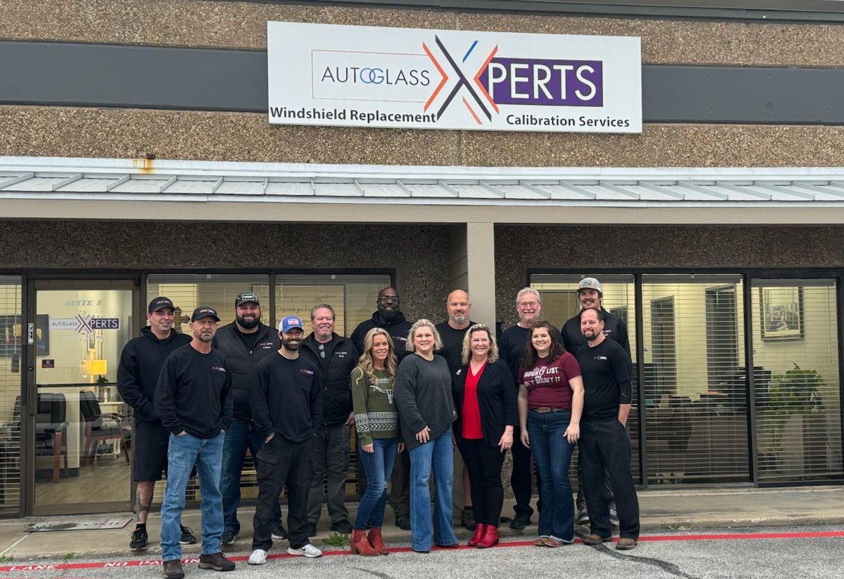 People in Front of a Building — Fort Worth, TX — Auto Glass Xperts