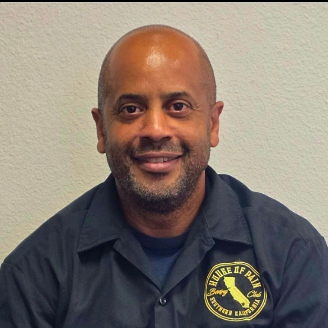 Coach Alex Chavez