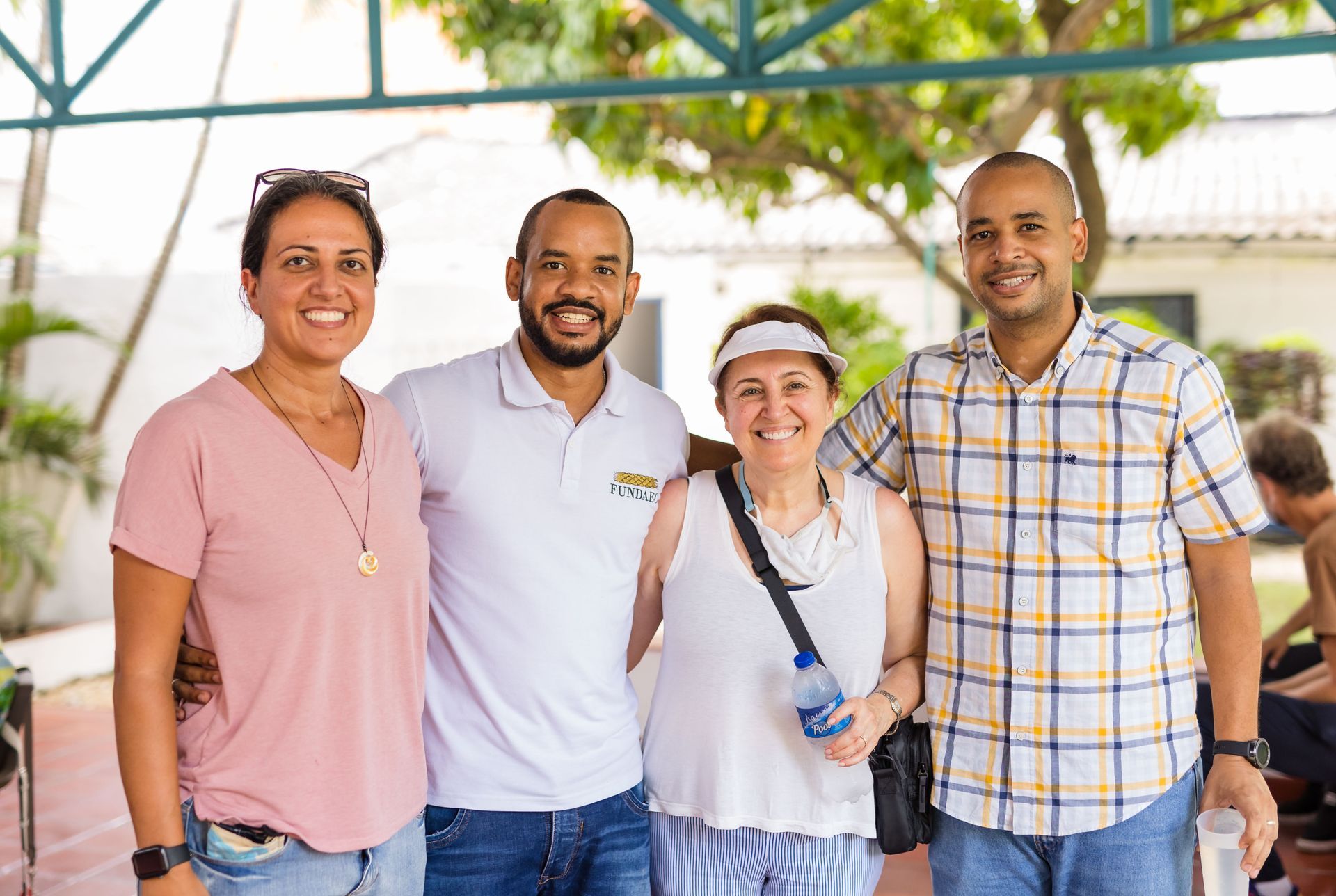 A group of people are posing for a picture together.