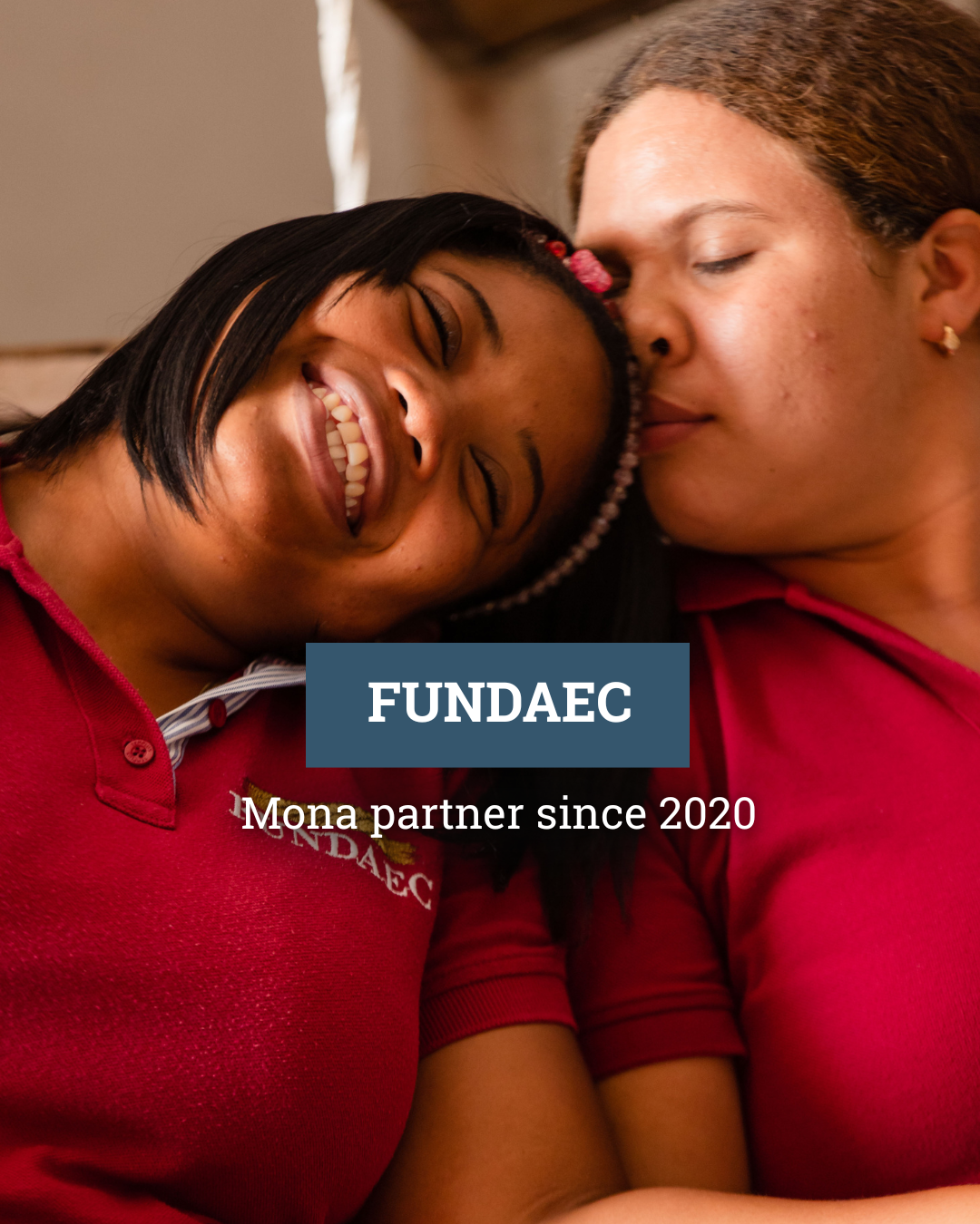 A woman is kneeling down in a garden planting a plant.