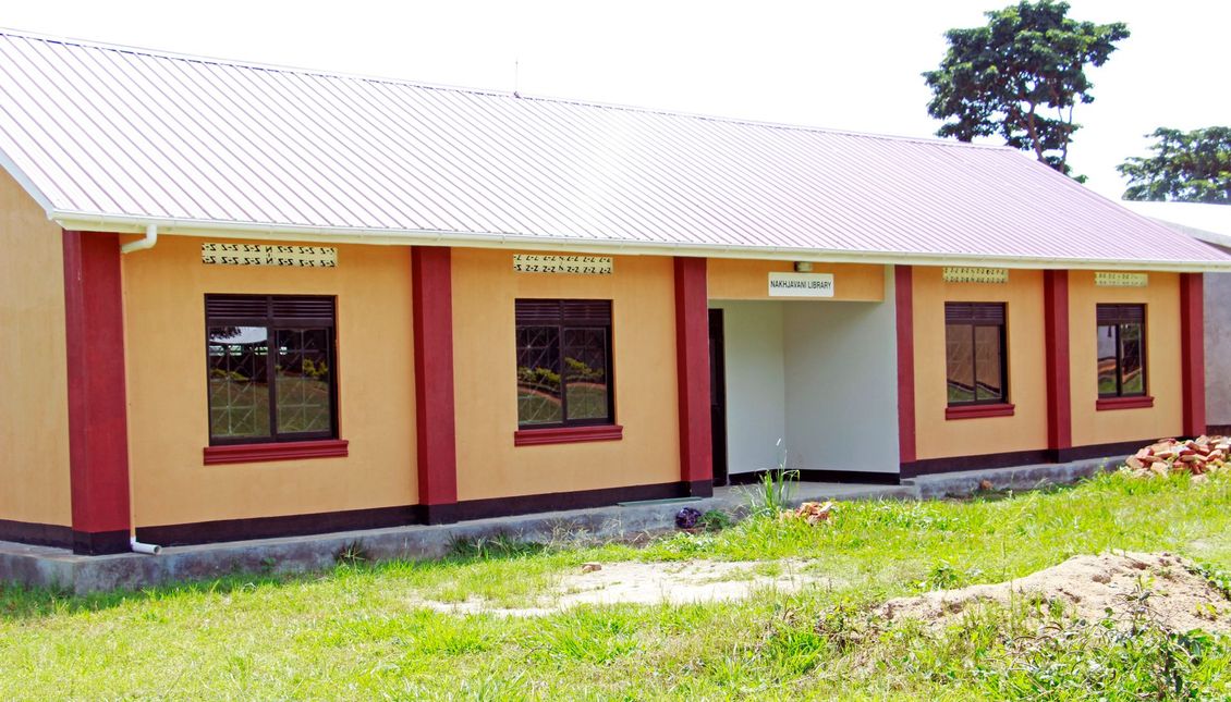 A building with a red roof and a few windows