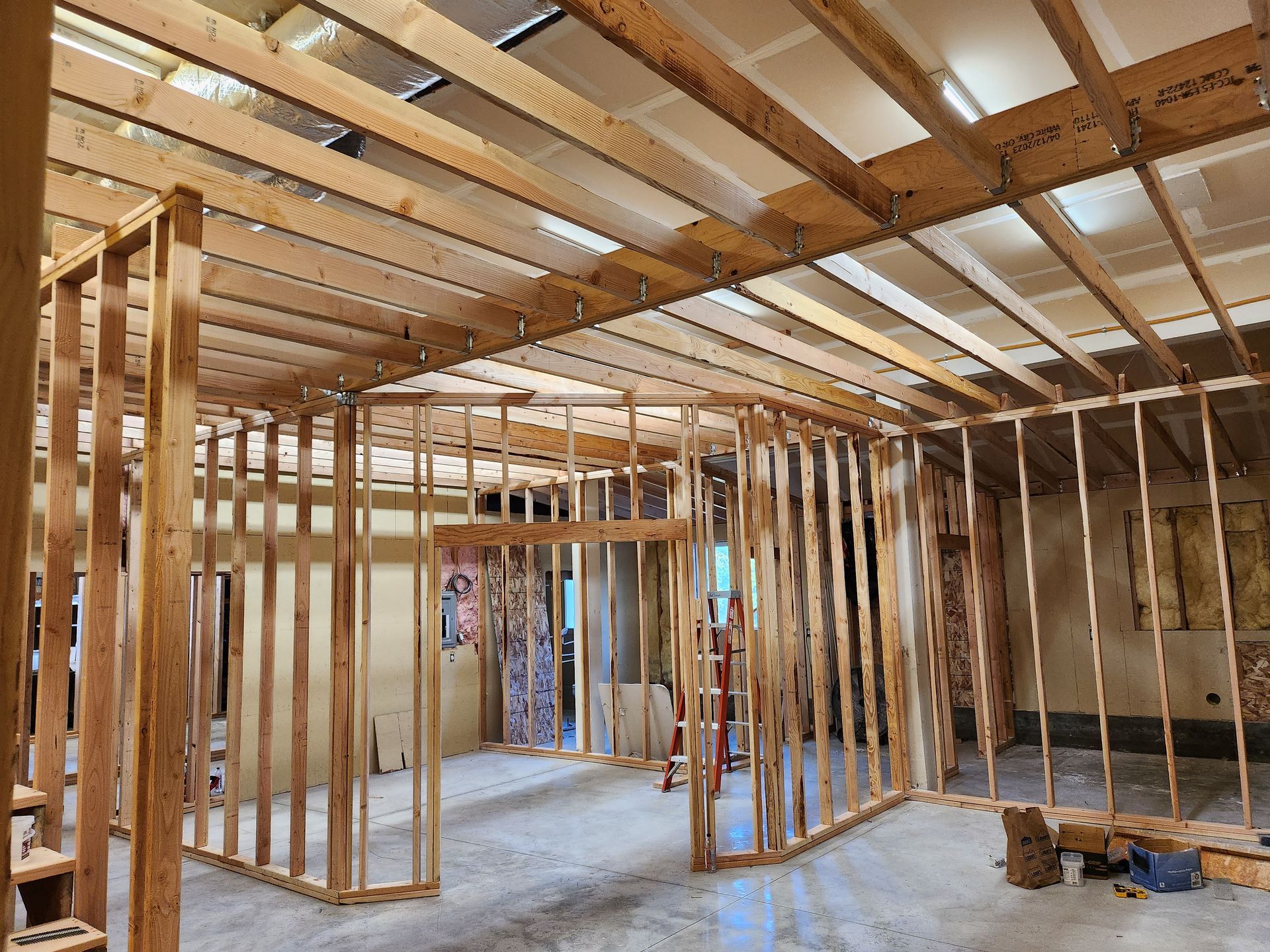 A room is being built with wooden beams and walls.