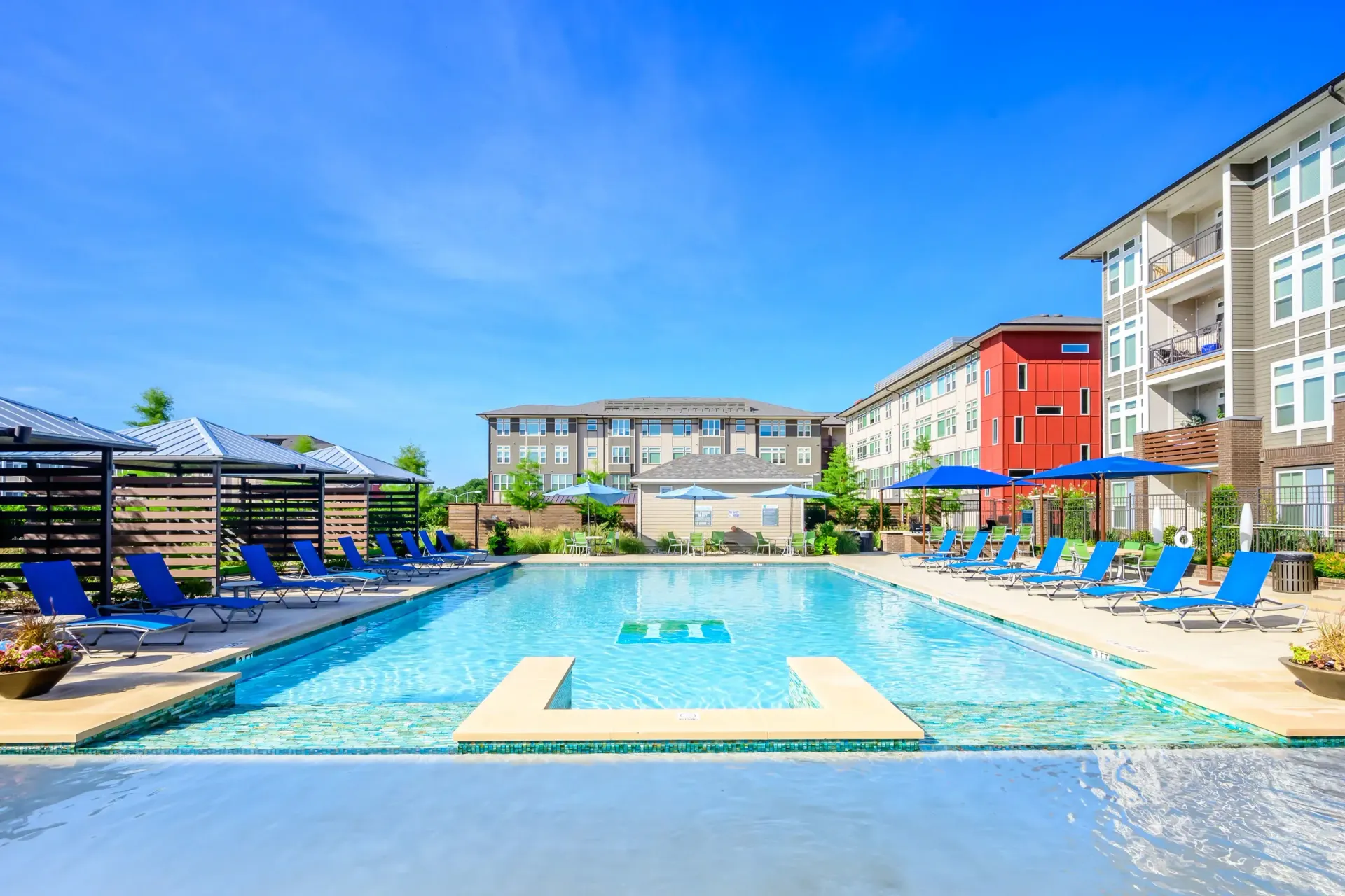 Swimming pool at Harmony Luxury Apartments in Rowlett, TX.