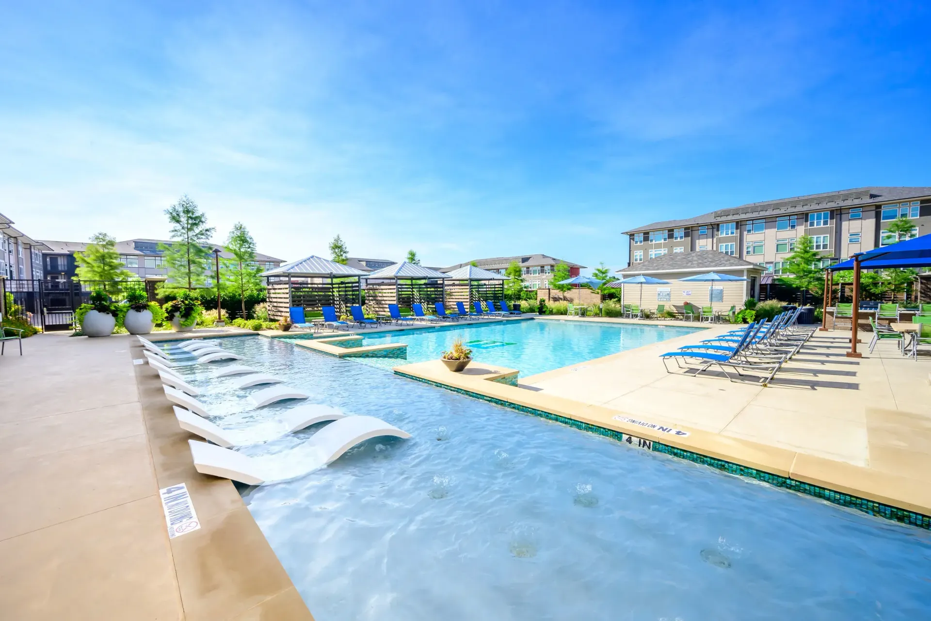 Swimming pool at Harmony Luxury Apartments in Rowlett, TX.