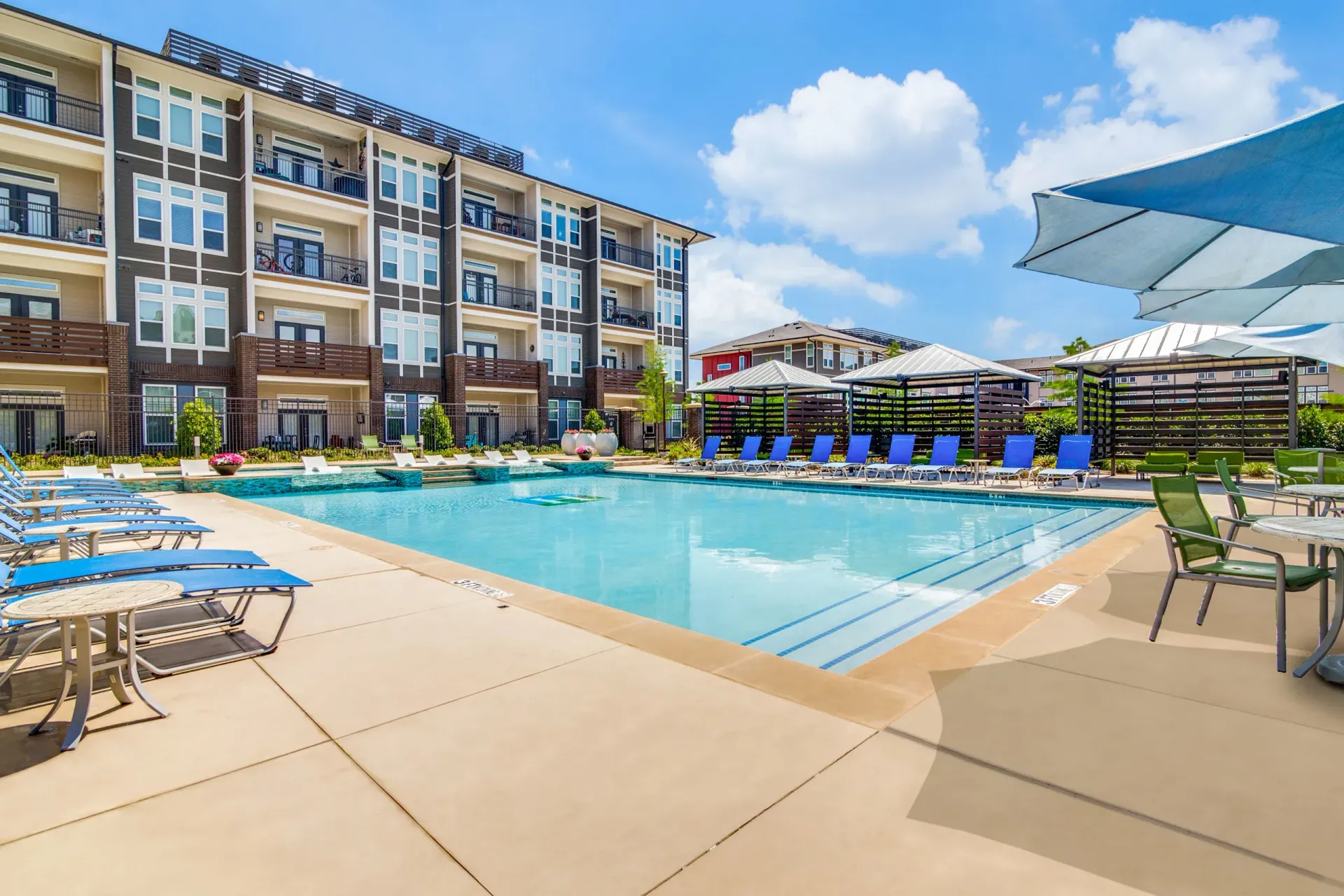 Swimming pool at Harmony Luxury Apartments in Rowlett, TX.
