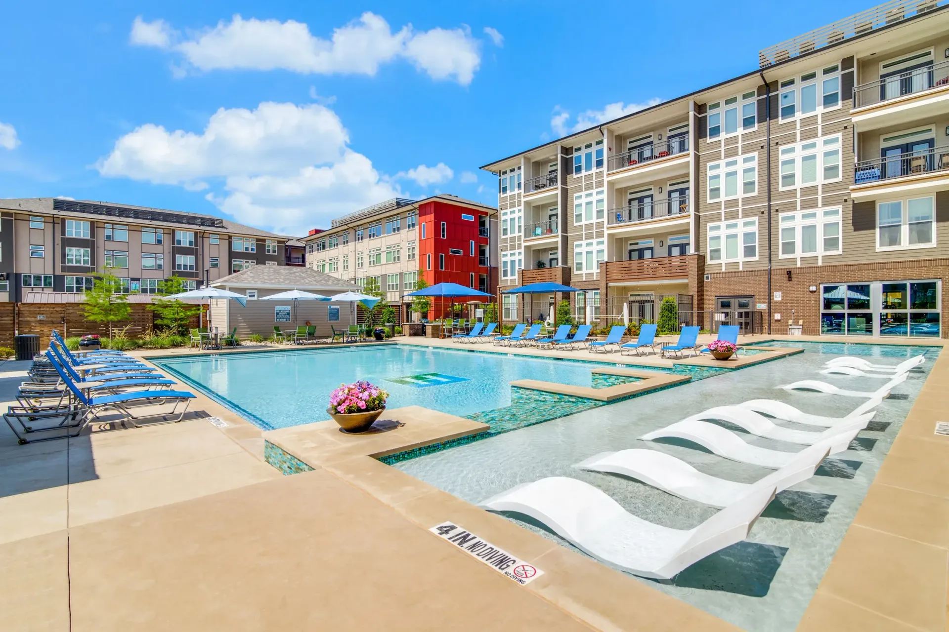 Swimming pool at Harmony Luxury Apartments in Rowlett, TX.