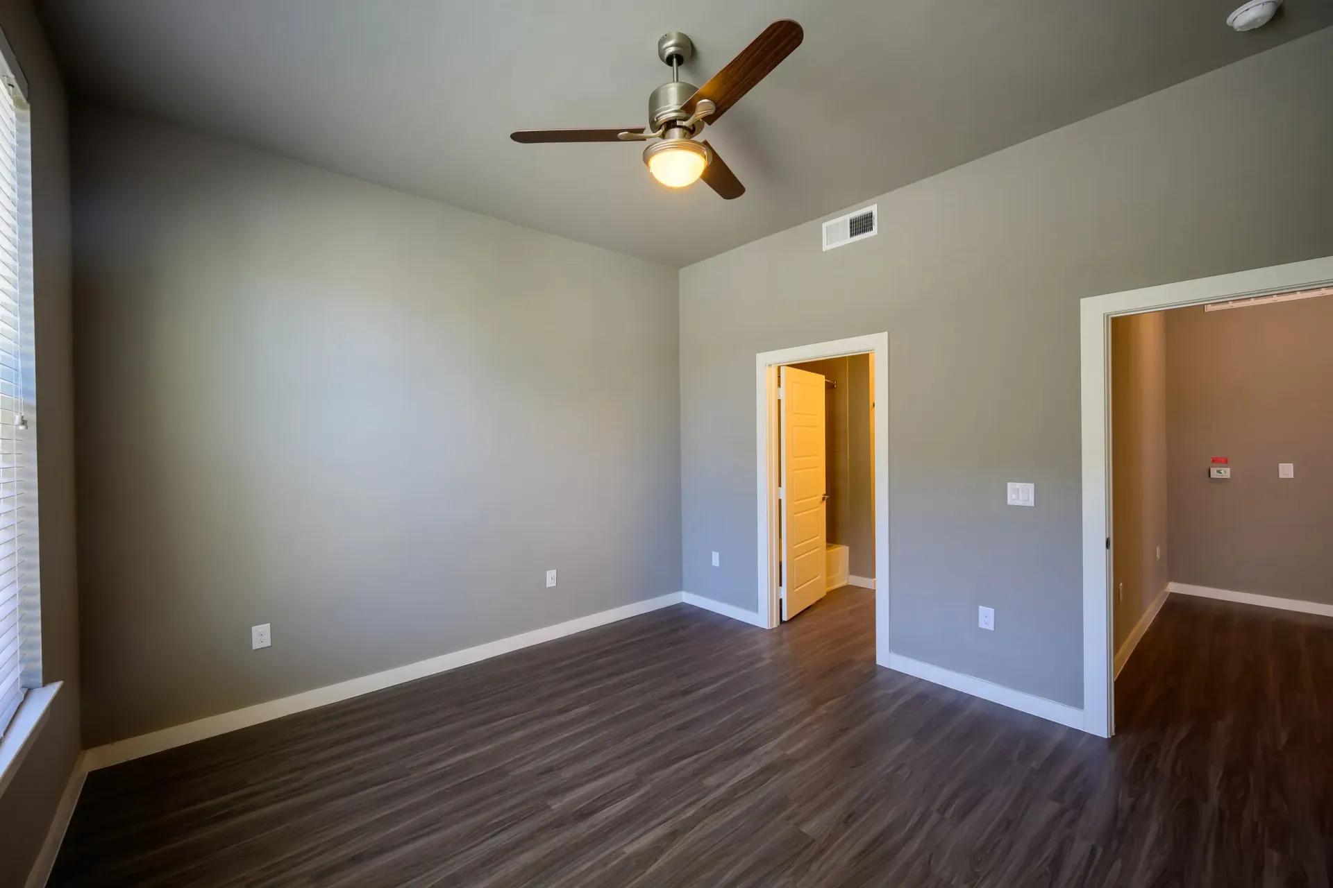 Bedroom at Harmony Luxury Apartments in Rowlett, TX.